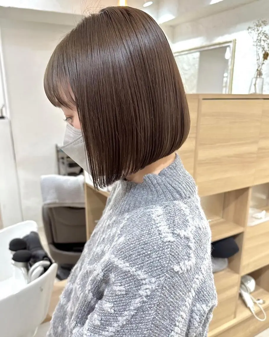 ショート カラー パーマ 切りっぱなしボブ 前下がりボブ ショートボブ 黒髪 デザインカラー カット ヘアカラー トリートメント 髪質改善 縮毛矯正/ レイヤー/銀座/本木のヘアスタイル