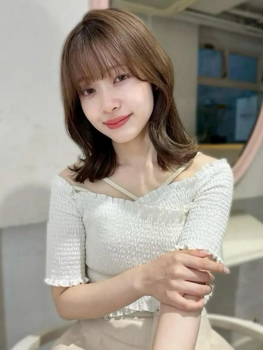 ミディアム 中村 かおりのヘアスタイル