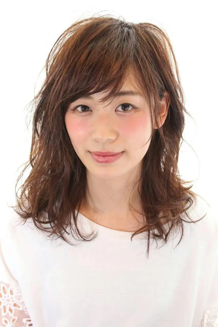 ミディアム 永見 敏英のヘアスタイル