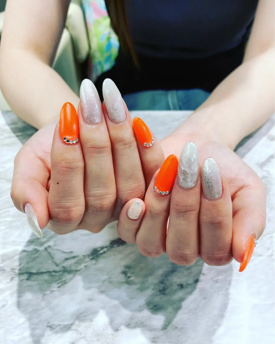 ネイル オレンジ ハンドネイル フットネイル ハンドケア ✴︎:.｡. MAKI.｡.:✴︎のネイルデザイン