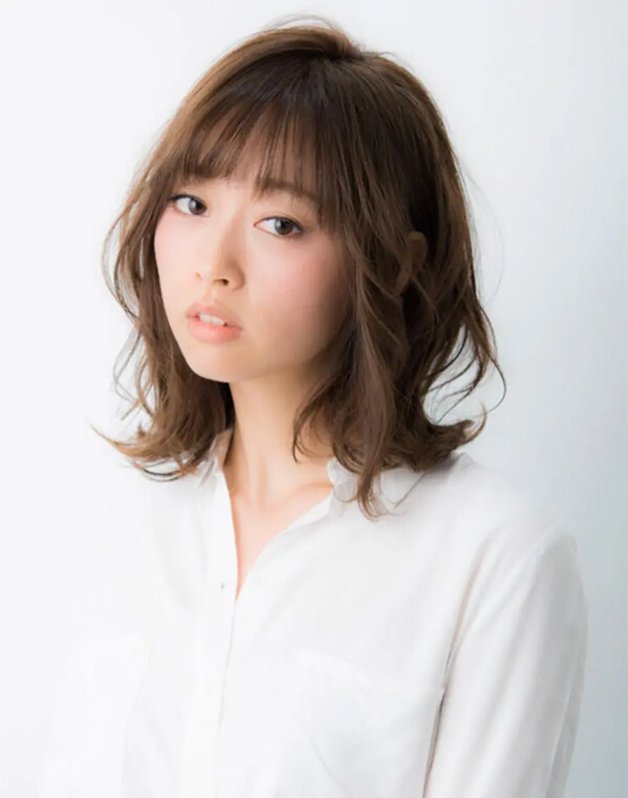 セミロング パーマ 趙 英来のヘアスタイル