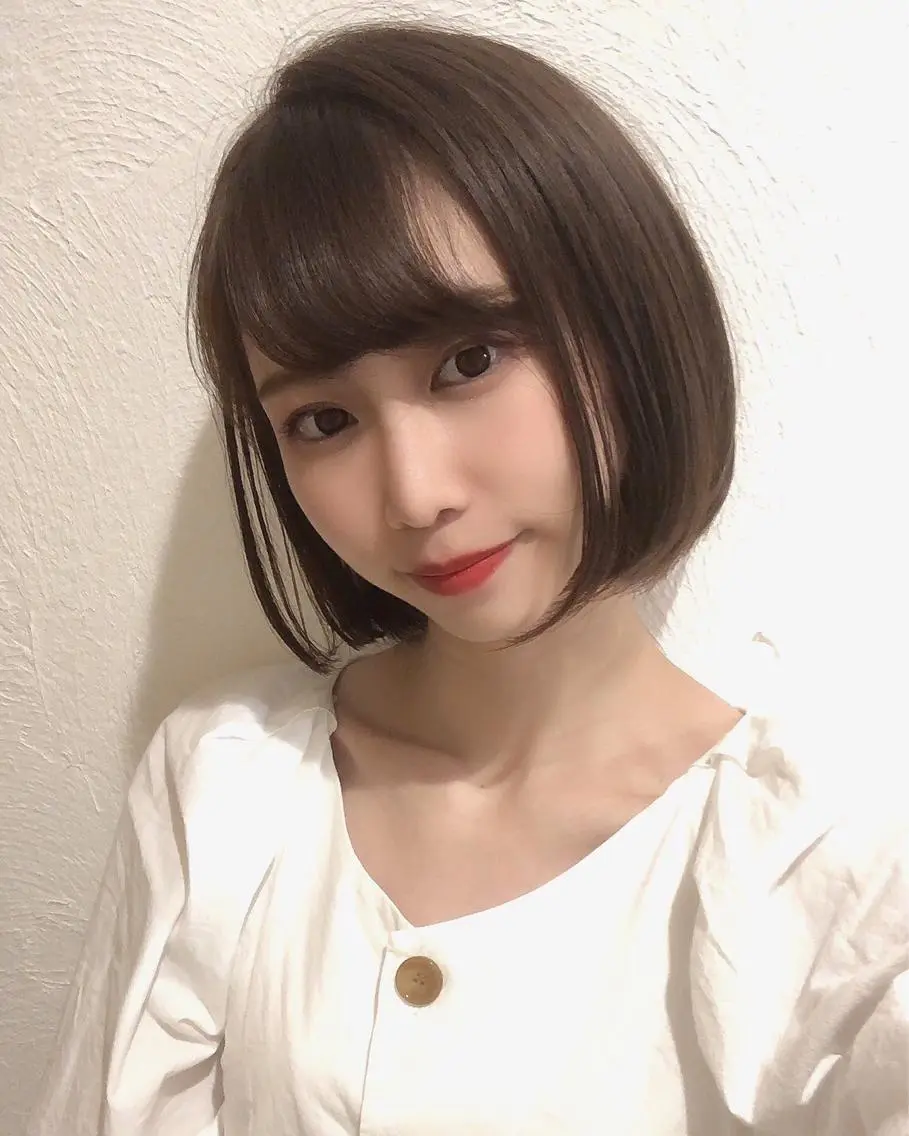 ショート レイヤーカット /透明感カラー西田のヘアスタイル