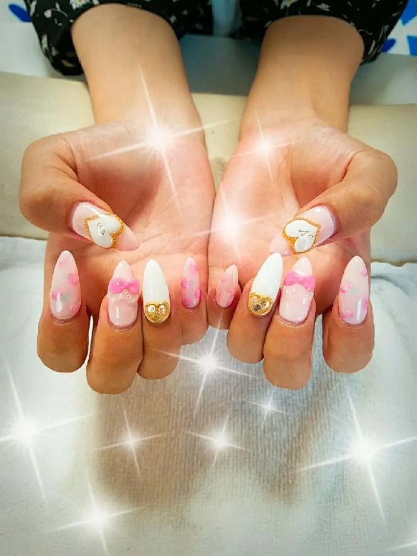 ネイル ハート リボン ＪＥＷＥＬ ＮＡＩＬのネイルデザイン