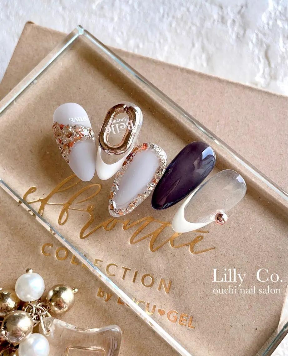 ネイル オレンジ パープル ハンドネイル ハンドケア Lilly Co.のネイルデザイン