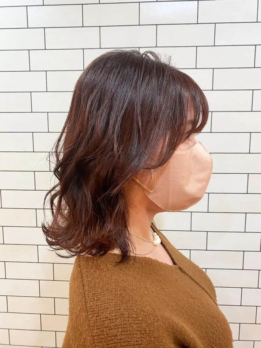 ミディアム カラー オレンジ くびれヘア ウルフカット カット ヘアカラー トリートメント TAI透明カラー 柔らかい縮毛矯正のヘアスタイル