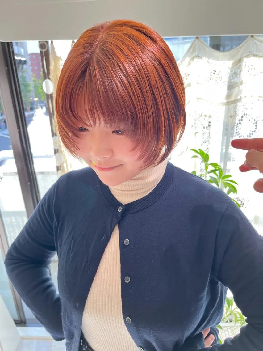 ショート カラー オレンジ 顔まわりレイヤー レイヤーカット Memories 銀座のその他イメージ