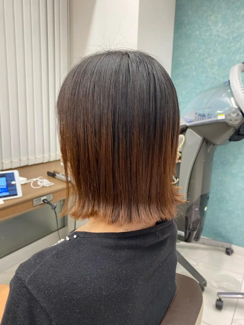 ミディアム ボブ 外ハネヘア 長妻莉央/縮毛矯正 髪質改善カラーのヘアスタイル