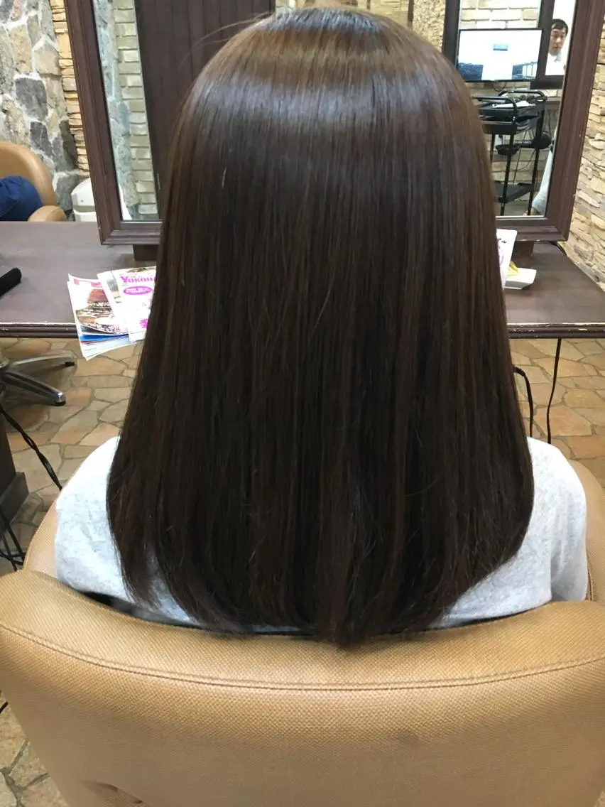 ミディアム 縮毛矯正 Kana .のヘアスタイル