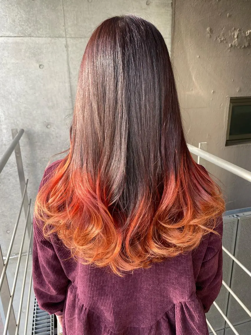 ロング カラー グラデーションカラー オレンジ レッドカラー MUK ムクのヘアスタイル