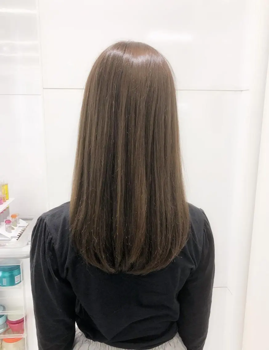 ロング パーマ 趙 英来のヘアスタイル