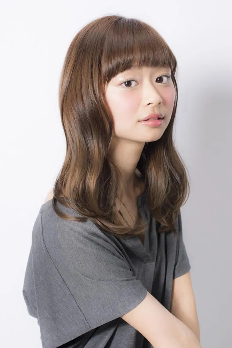 ロング パーマ 趙 英来のヘアスタイル