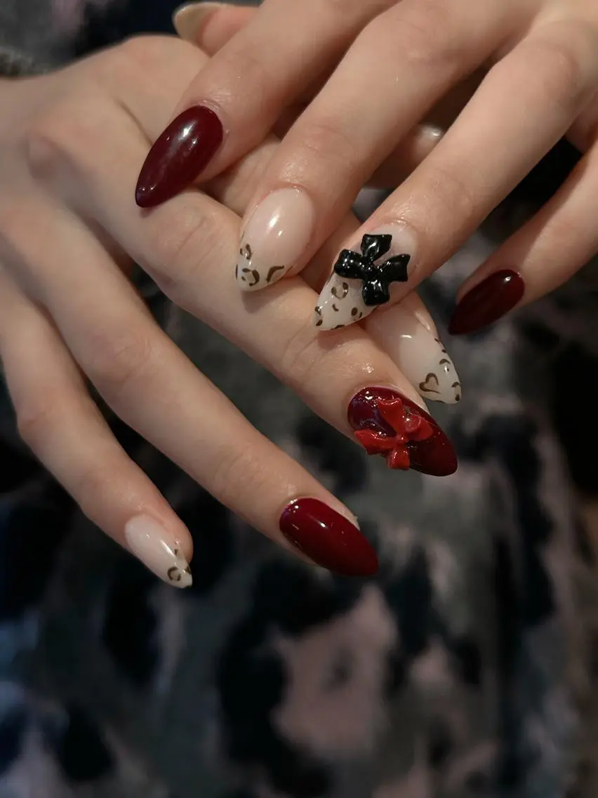 ネイル アニマル柄 ボルドー 赤色 リボン 冬ネイル ハンドネイル Bianca名駅店 まおのネイルデザイン