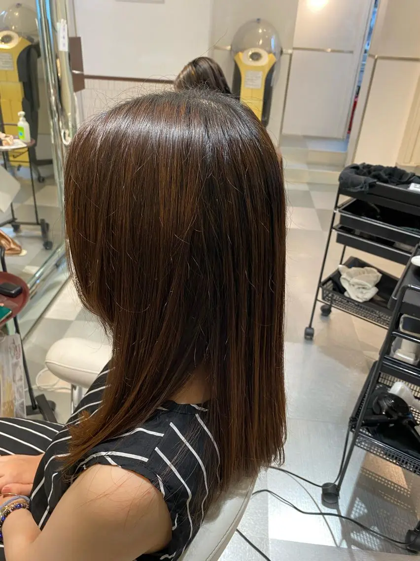 ロング トリートメント 酸熱トリートメント コテ巻き風パーマ 藤澤　知彌のヘアスタイル