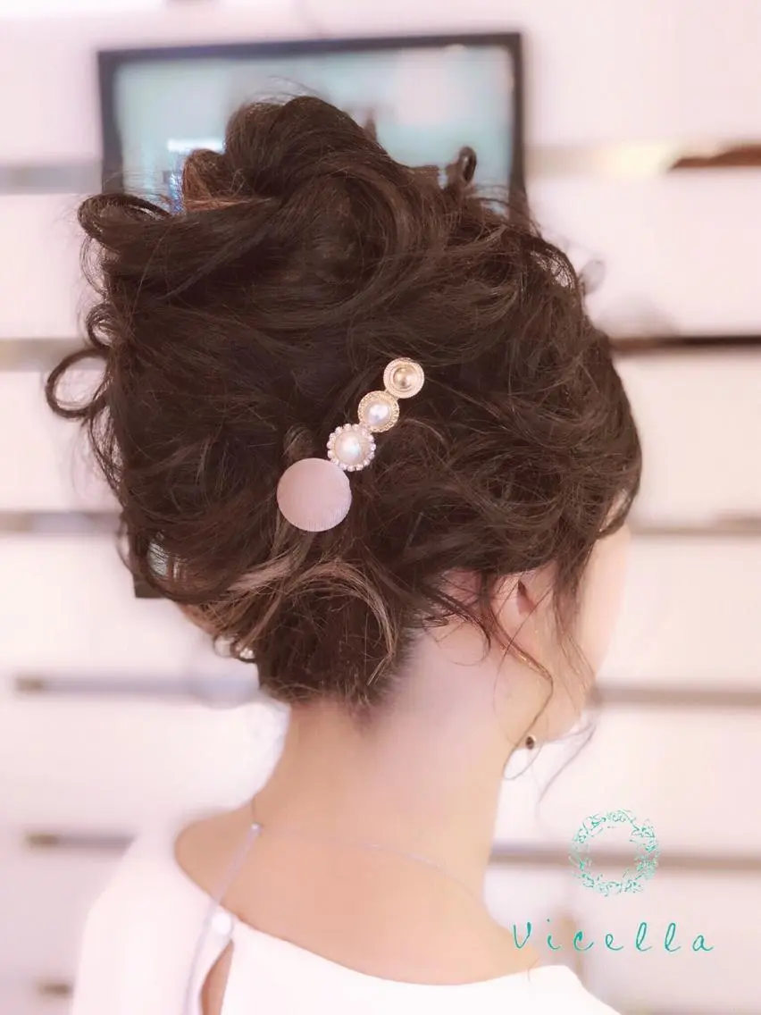 ロング ヘアアレンジ 夜会巻き 柴田泰秀sotti. 髪質改善/ブリーチのヘアスタイル