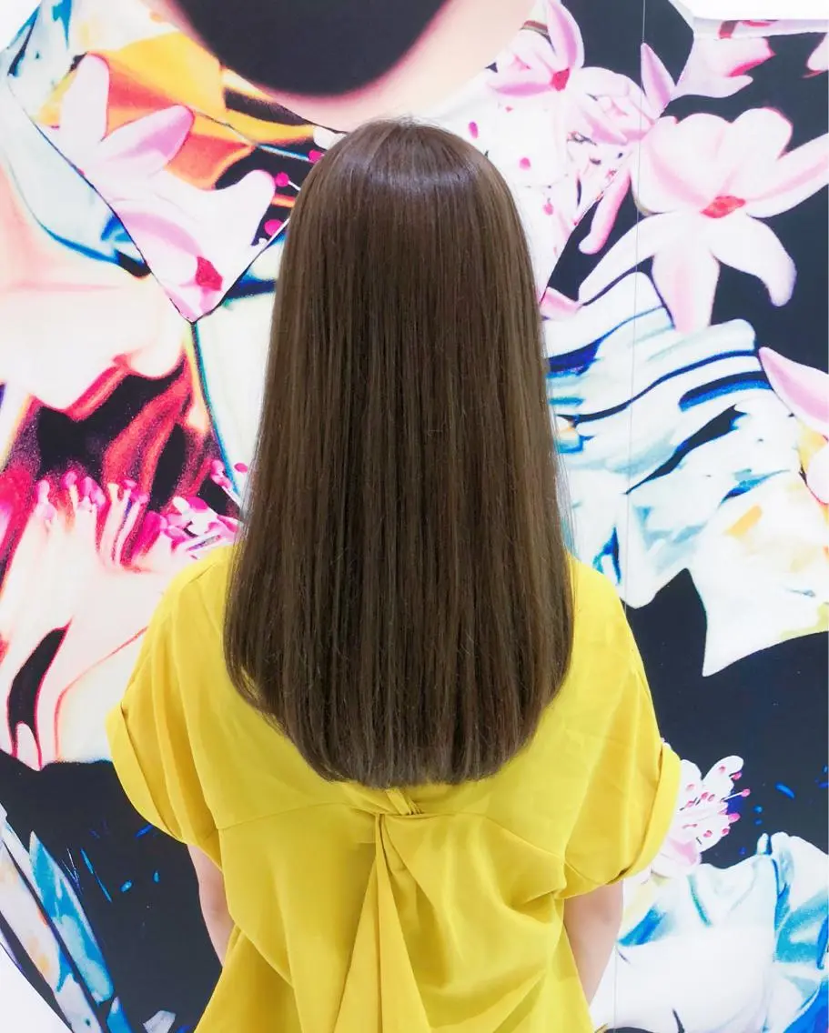 ロング パーマ 趙 英来のヘアスタイル