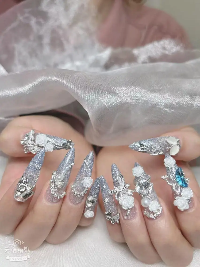 ネイル 成人式 マグネットネイル 大理石ネイル(マーブル) リボン 夏ネイル ハンドネイル ハンドケア k.bi nailsalonのネイルデザイン