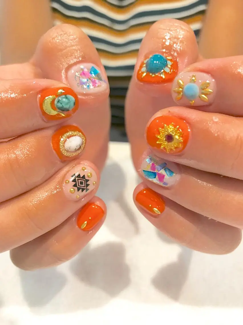ネイル オレンジ NARUMI HYODOのネイルデザイン