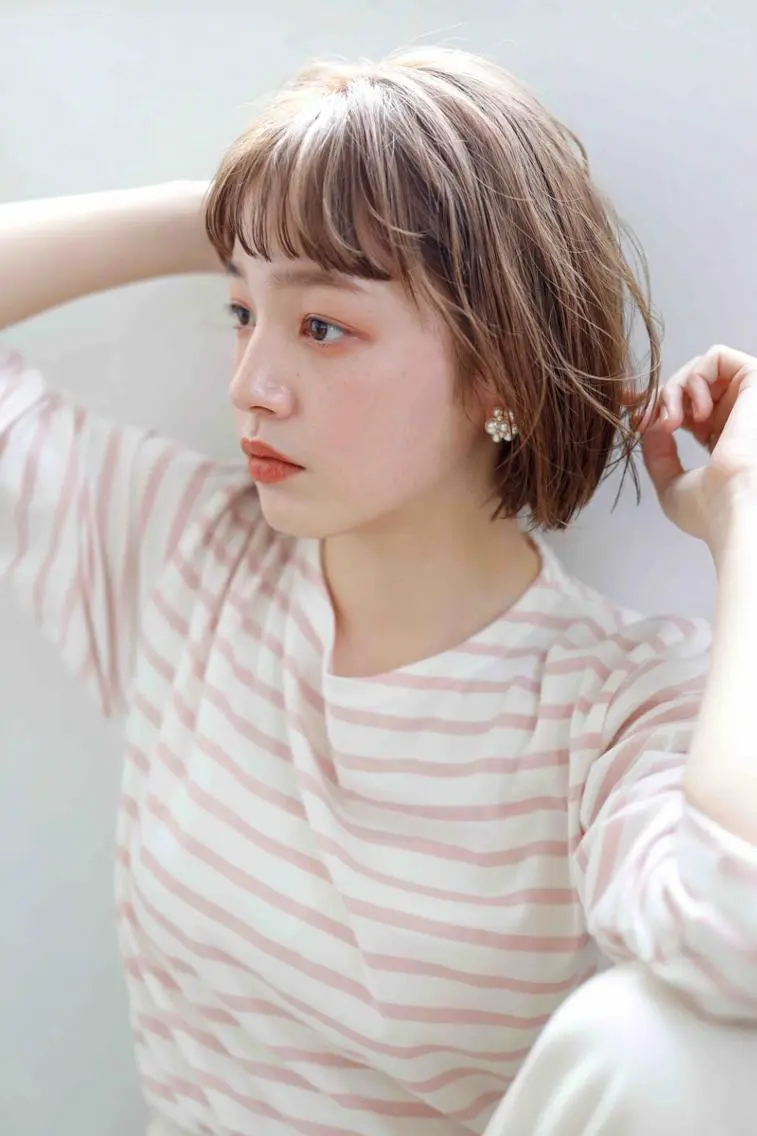 ショート カラー パーマ アディクシーカラー ベージュカラー ケアカラー 透明感カラー イヤリングカラー カット ヘアカラー トリートメント ヘアケア特化型サロン newi 京橋のヘアスタイル