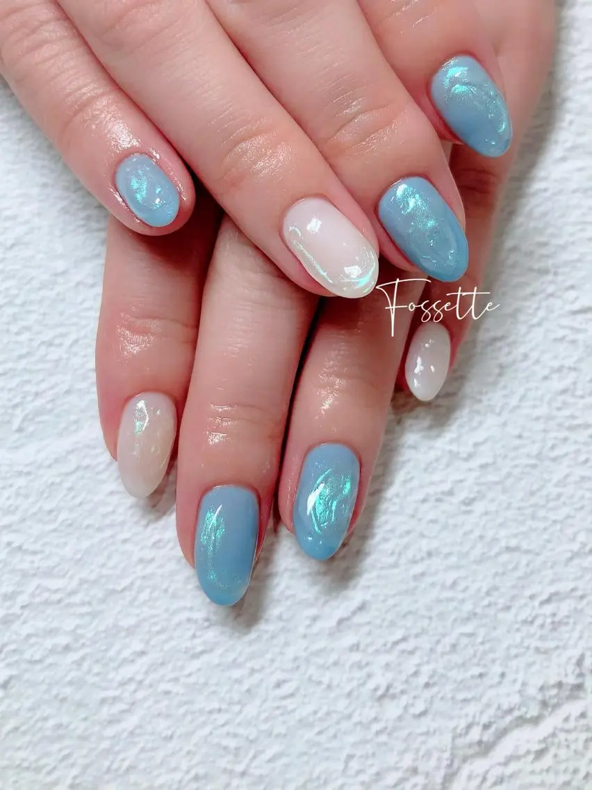 ネイル オーロラネイル ブルー クリアネイル ニュアンスネイル ぷっくりネイル ハンドネイル nailsalon Fossetteのネイルデザイン