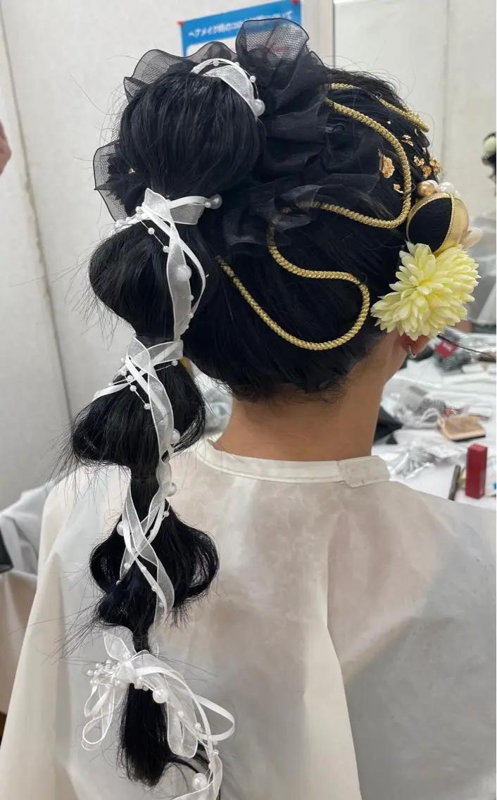 ロング 開發 紗貴のヘアスタイル