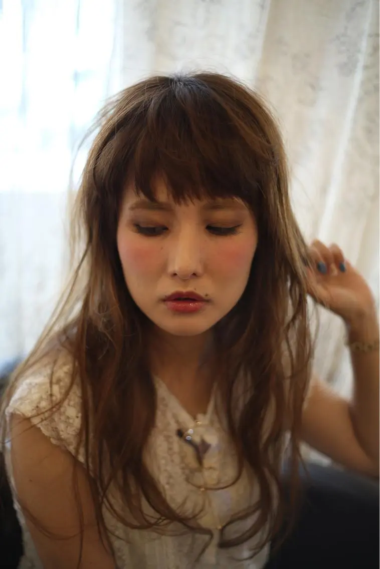 ロング 工藤 久美のヘアスタイル