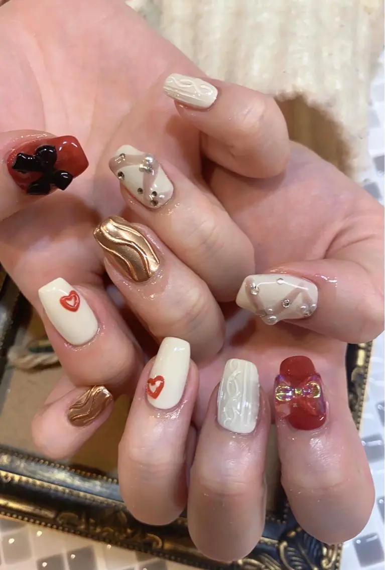 ネイル リボン nailist yuiのネイルデザイン