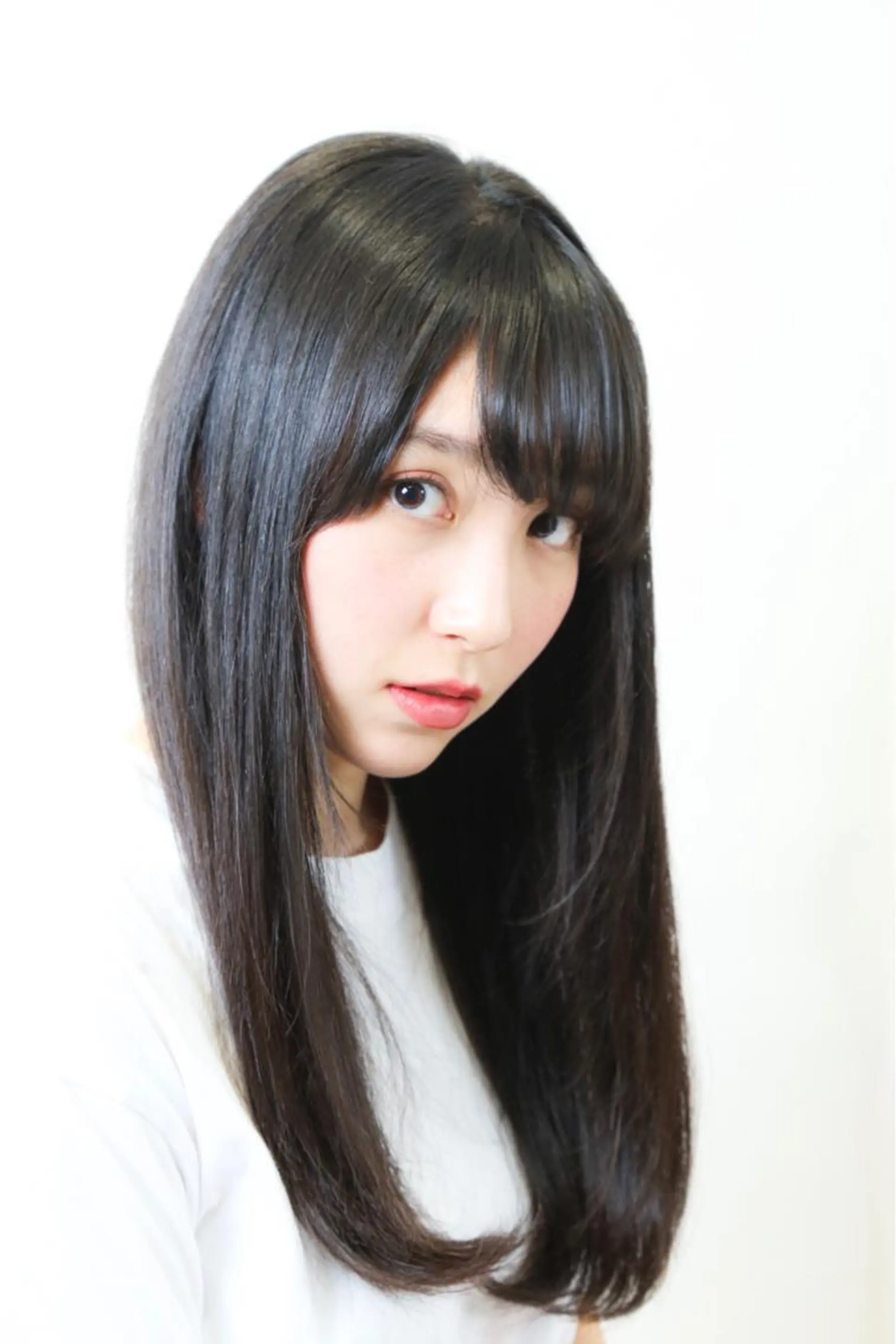 ロング TAI透明カラー 柔らかい縮毛矯正のヘアスタイル