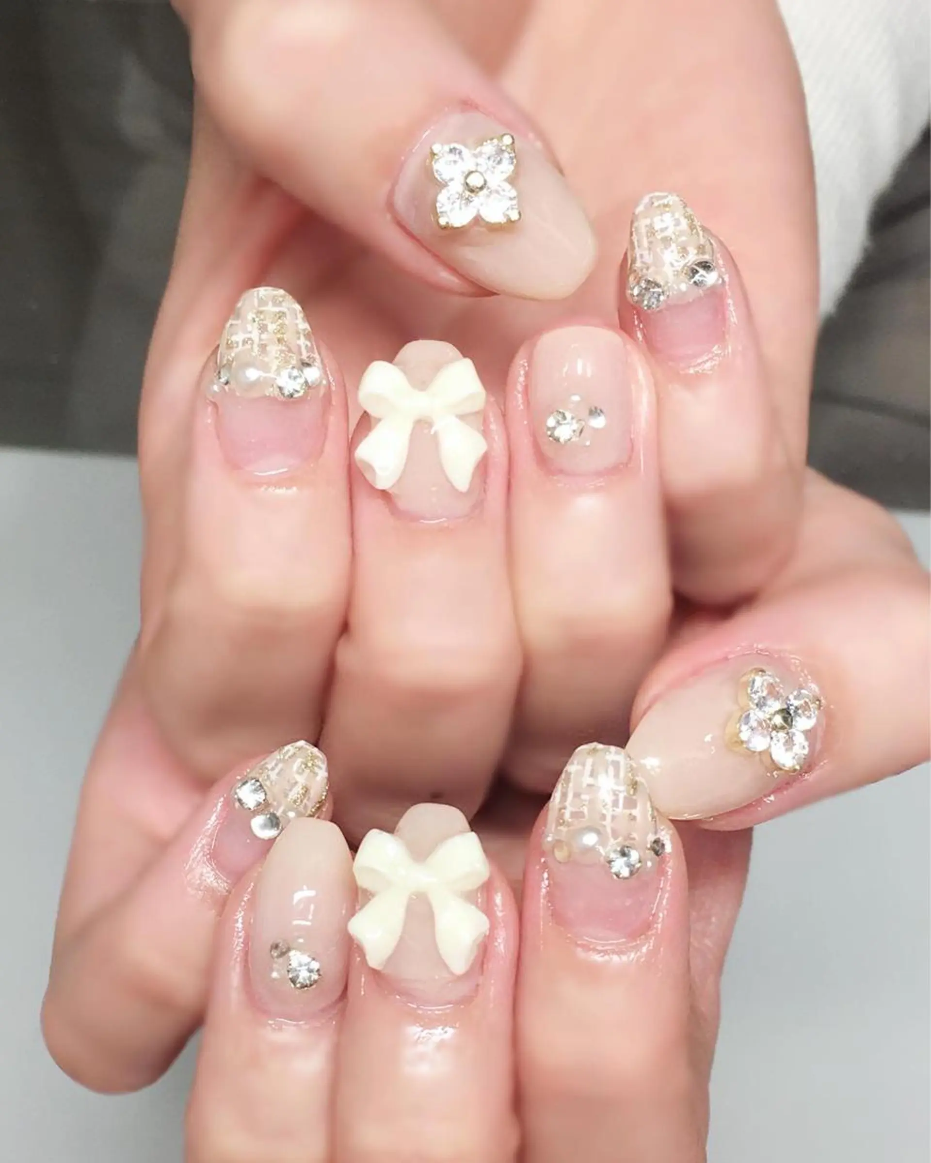 ネイル ジェルネイル キラキラネイル ピンク リボン 春ネイル Nyanco Nailのネイルデザイン