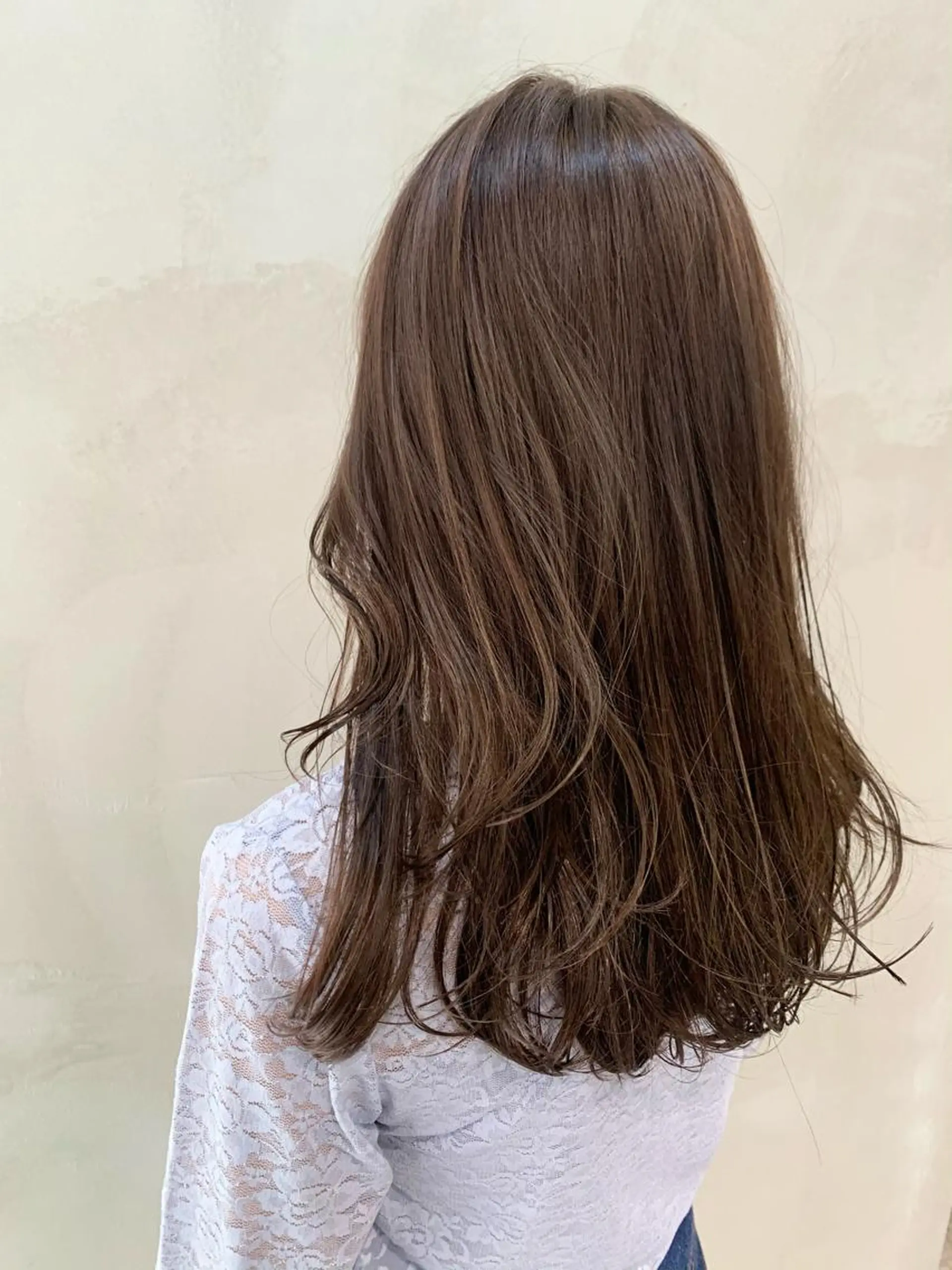 ロング 堤 麻衣子のヘアスタイル