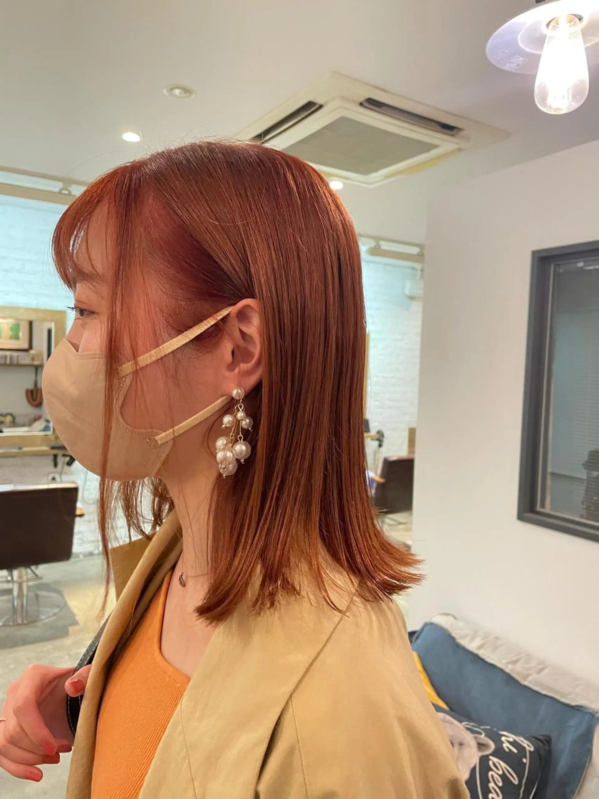 ミディアム カラー オレンジ 飯塚 七海のヘアスタイル