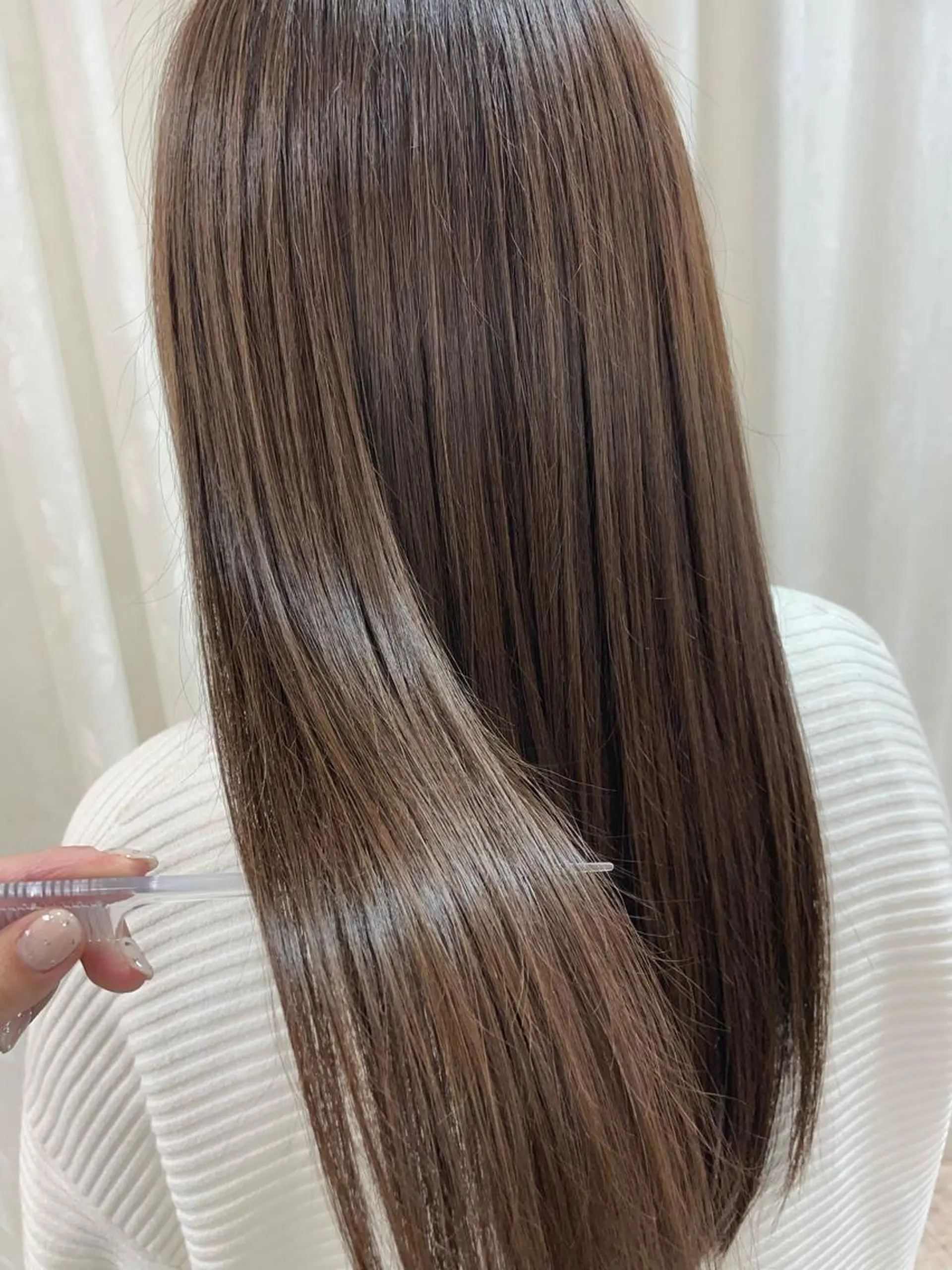 ロング トリートメント 對馬 光梨のヘアスタイル