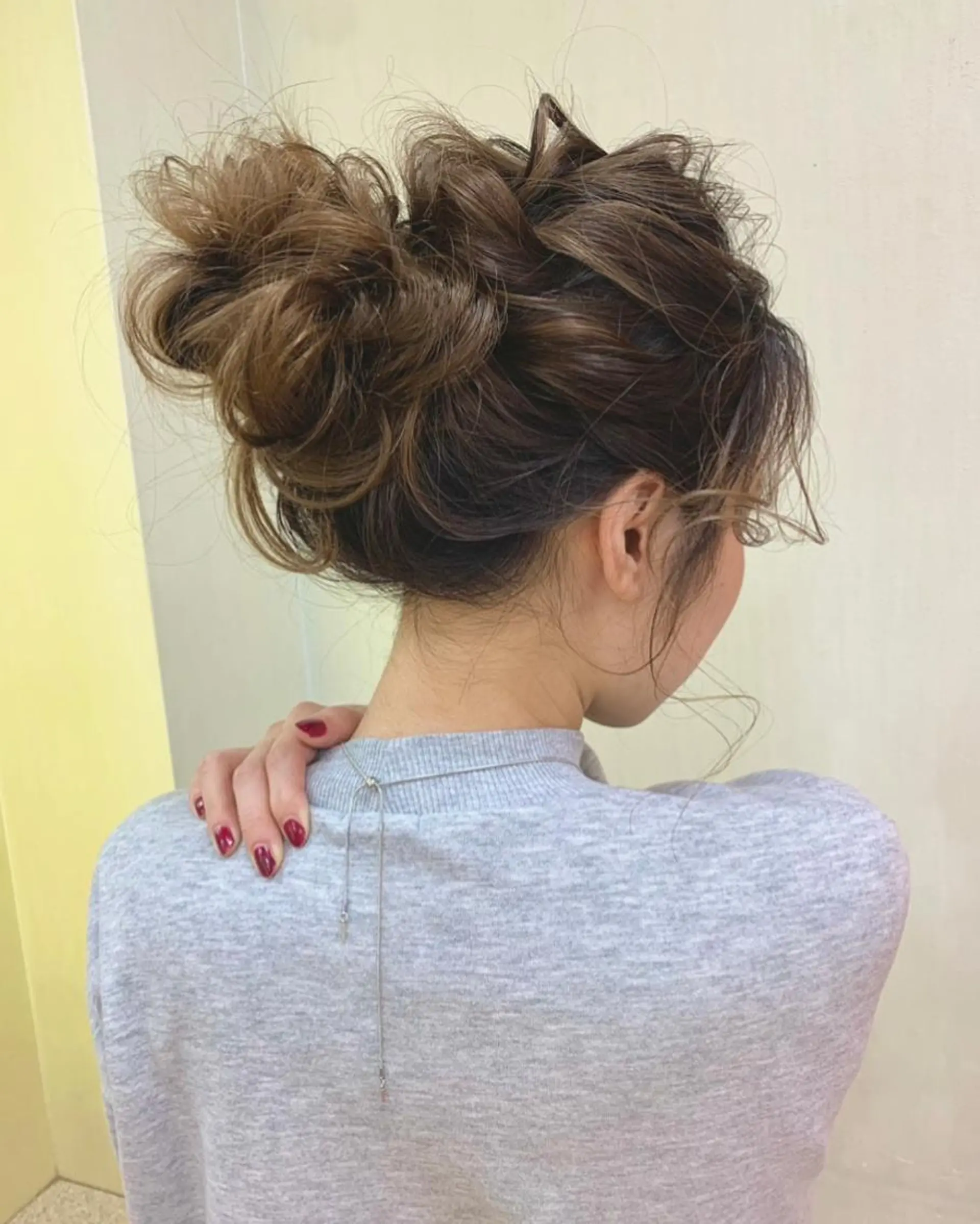 ロング ヘアアレンジ お団子ヘア yui .のヘアスタイル