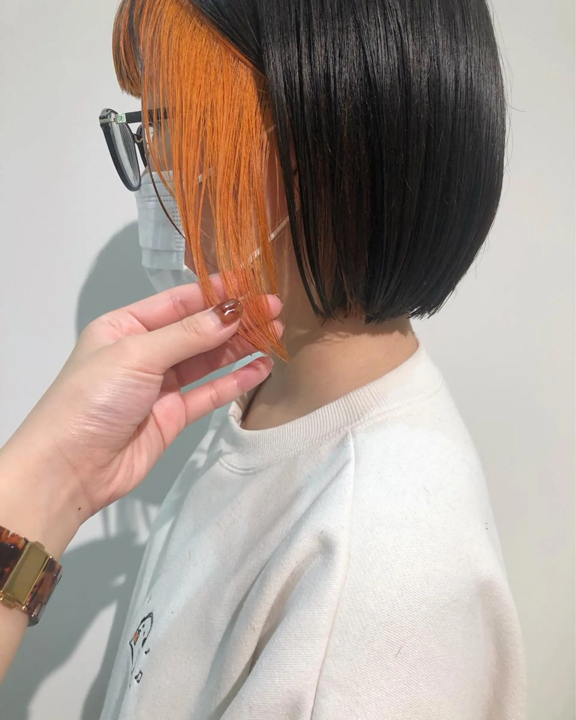 ミディアム カラー ブリーチ オレンジ ボブ 外ハネヘア 髪質改善/レイヤー/ お顔まわり/Ami.のヘアスタイル