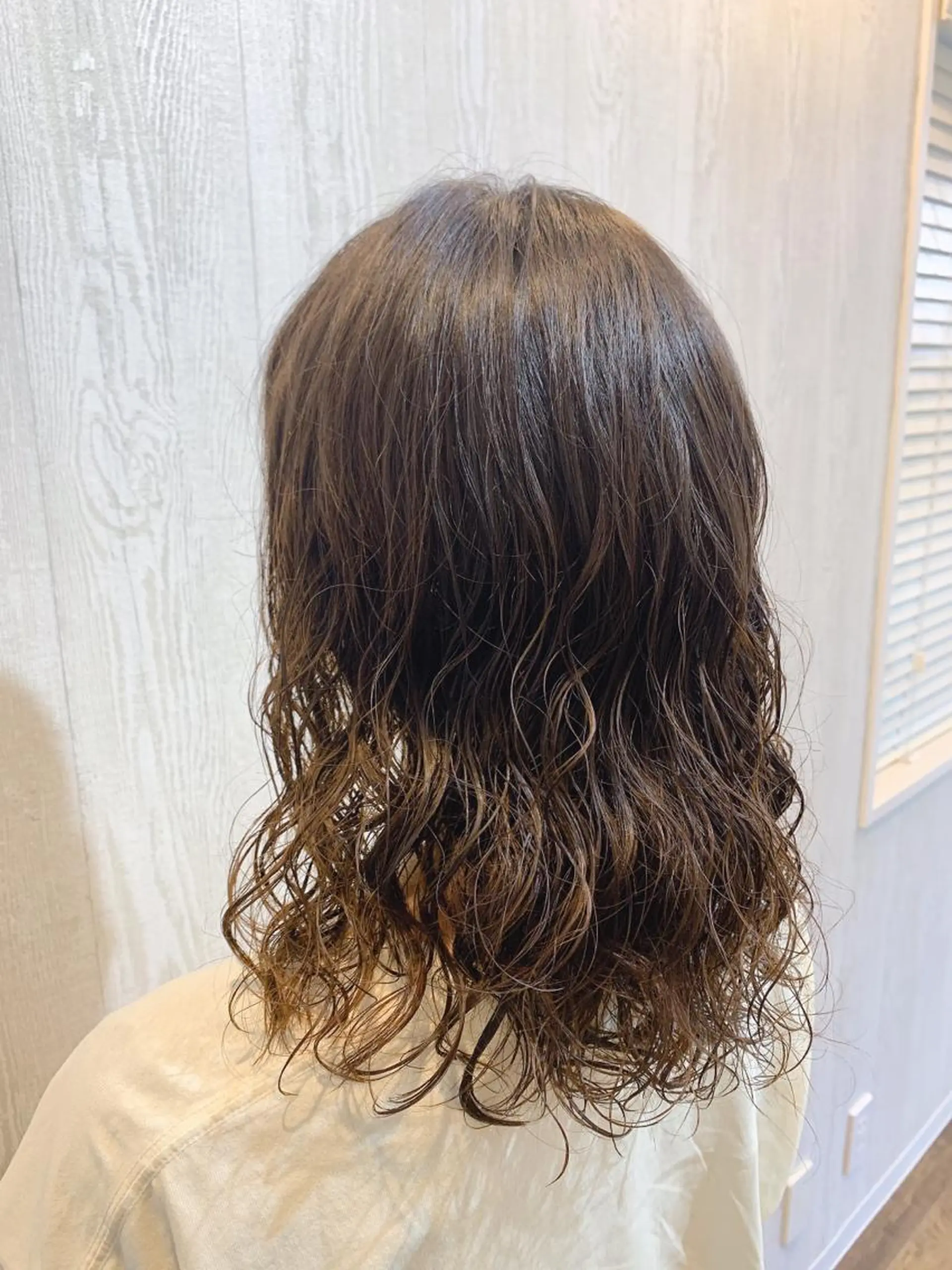 ミディアム パーマ ヘアアレンジ HUENEST アカデミーサロンのヘアスタイル