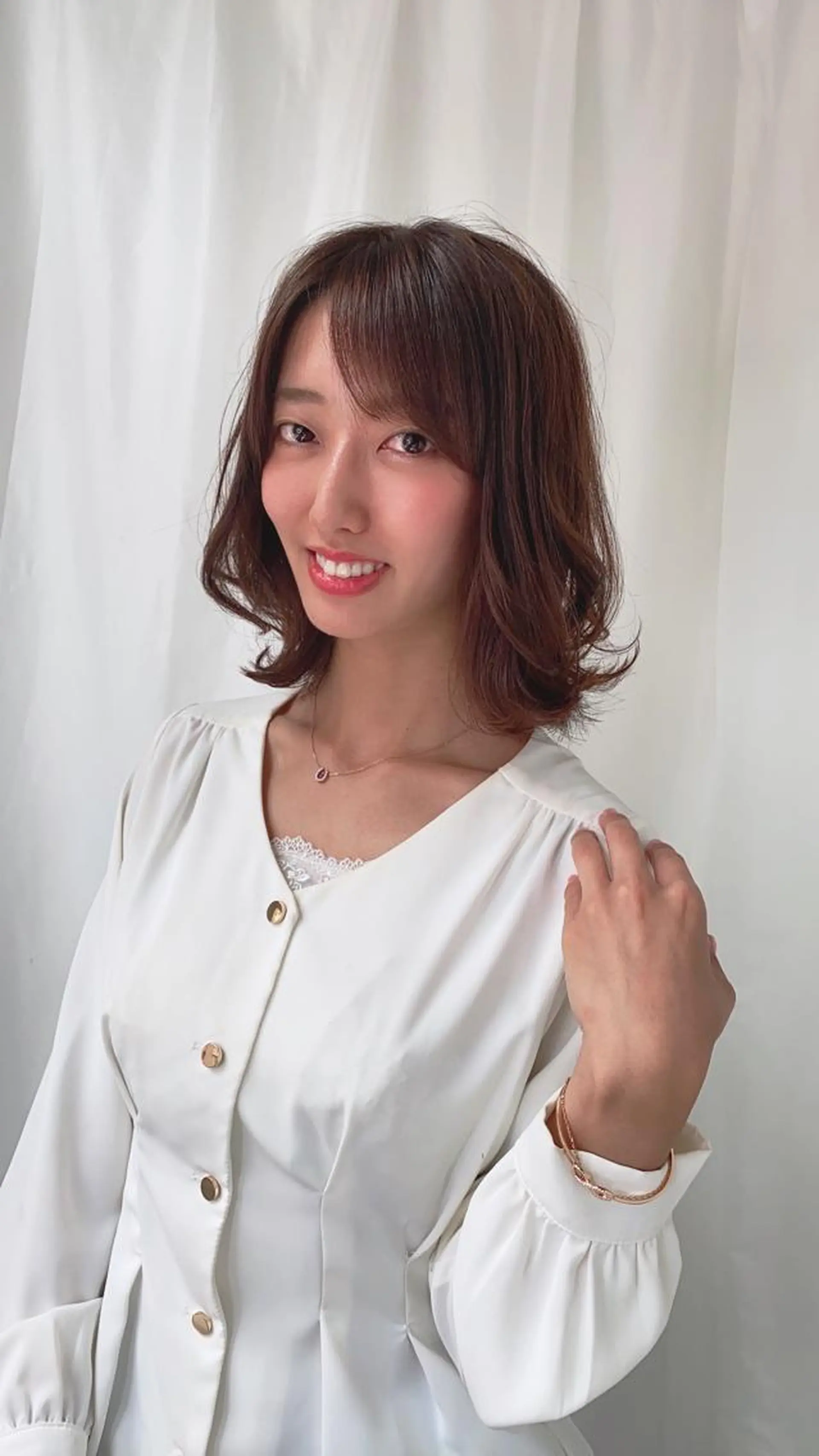 ミディアム ヘッドスパ パーマ・レイヤー 髪質改善・TANIのヘアスタイル