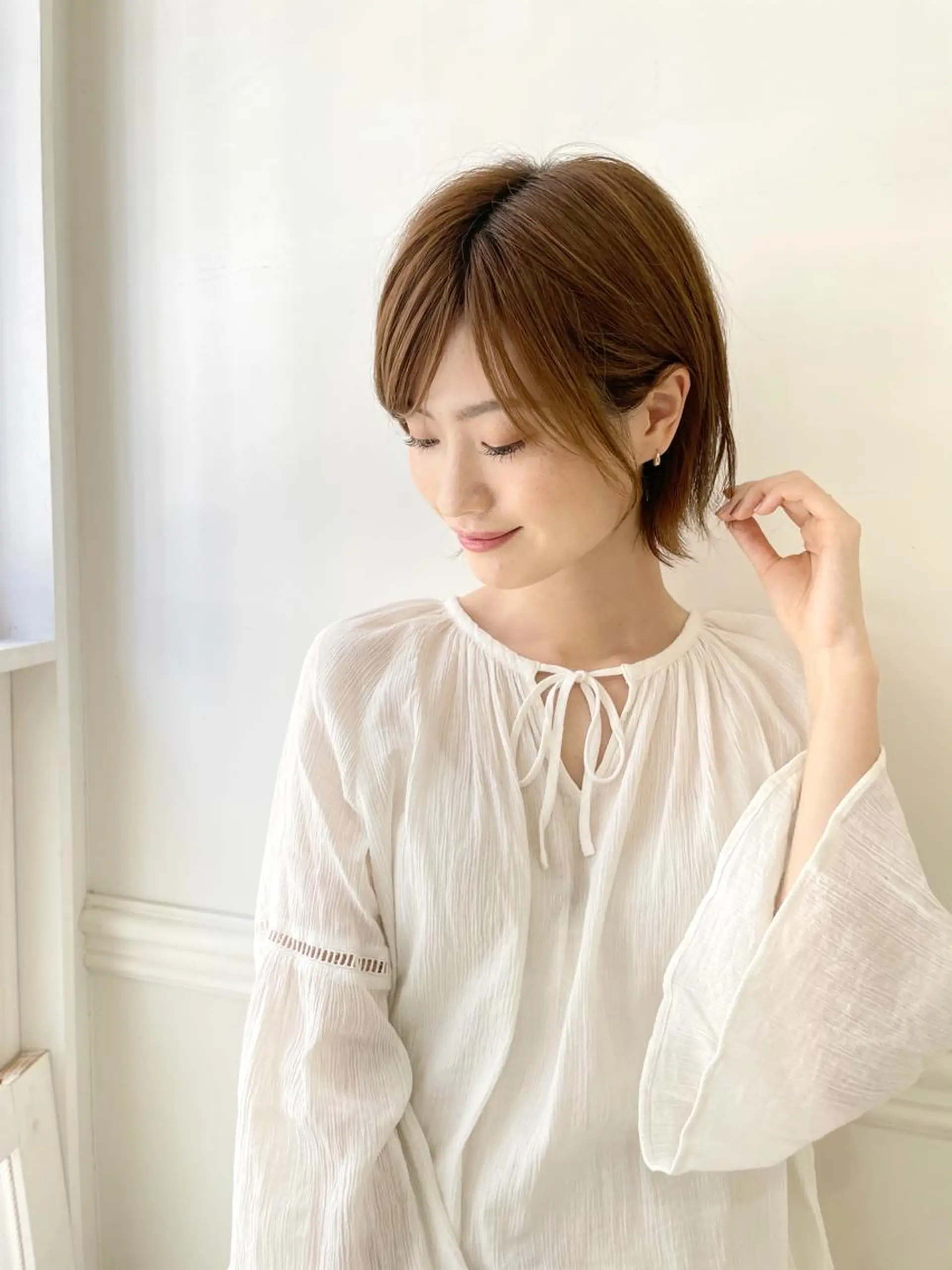 ショート esse大阪茶屋町店所属・レイヤーカット 新井田陽寿のヘアスタイル