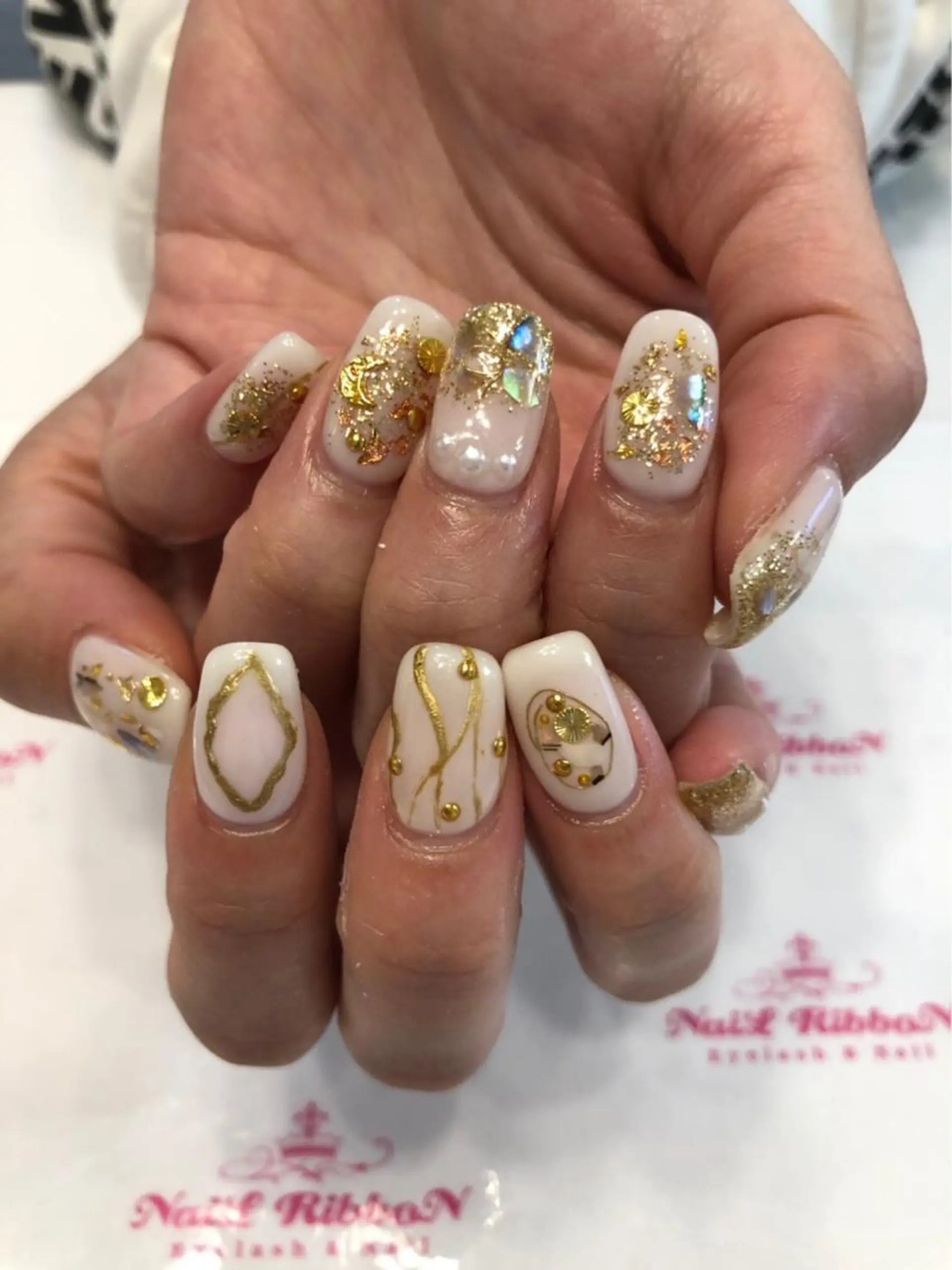 ネイル 春ネイル ネイルリボン 受付スタッフのネイルデザイン