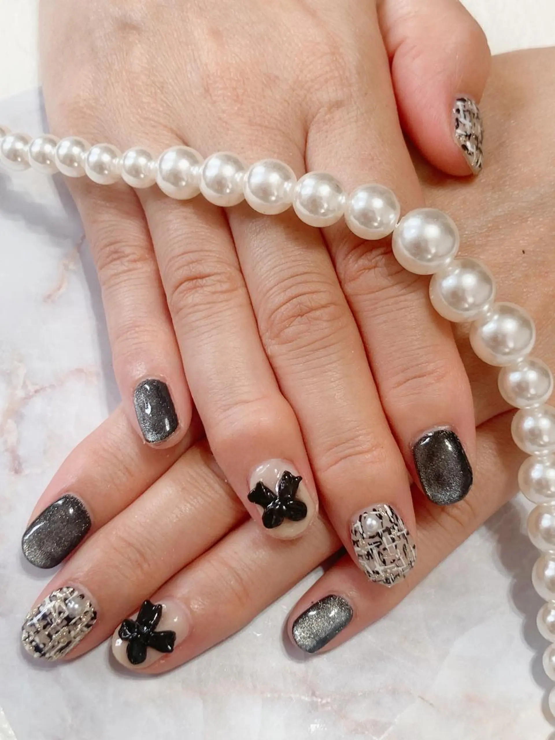 ネイル マグネットネイル リボン ツイードネイル ネイルケアサロン Campanulaのネイルデザイン