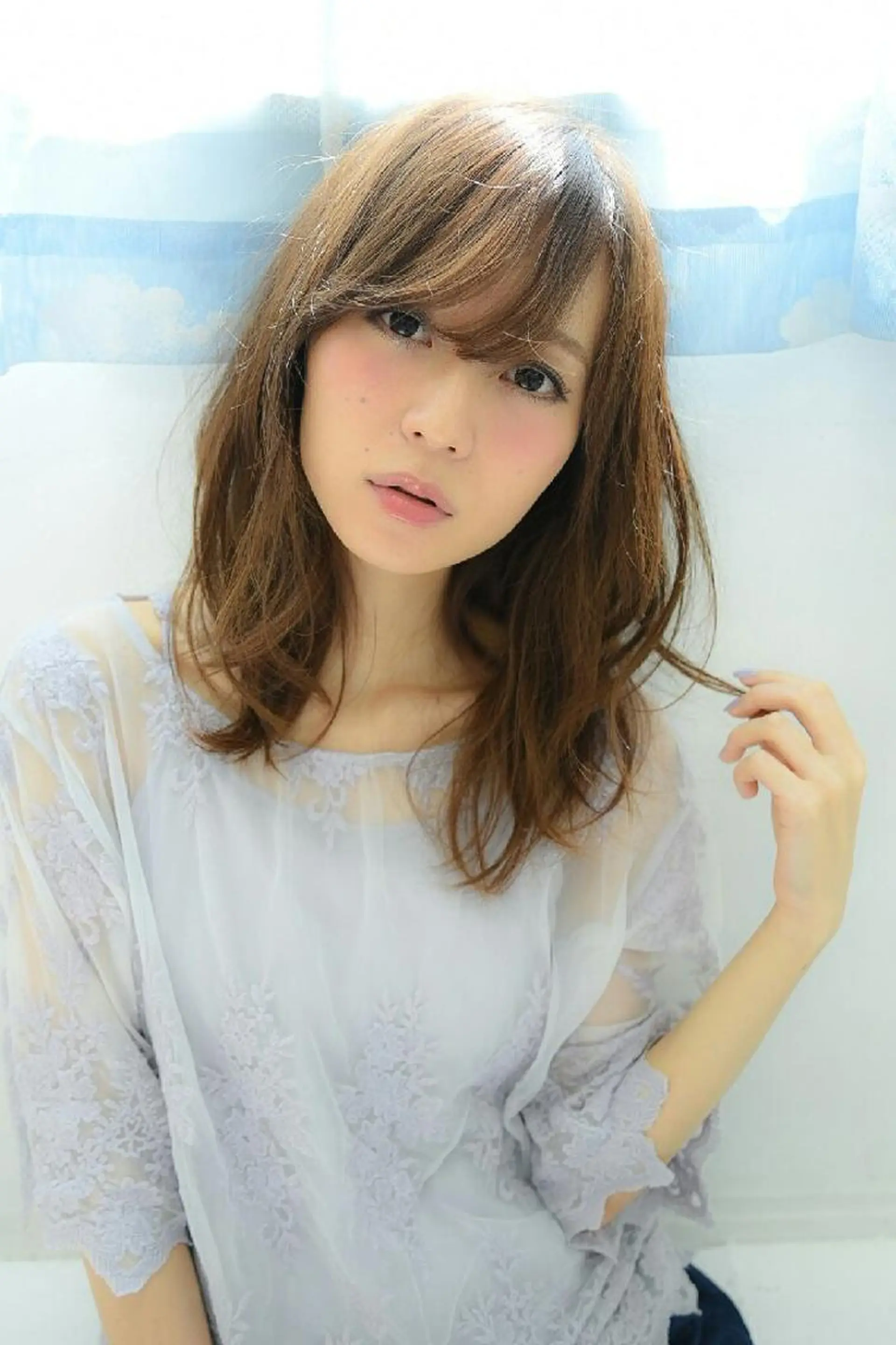 セミロング 海外レイヤー/ 梅田美容室のヘアスタイル