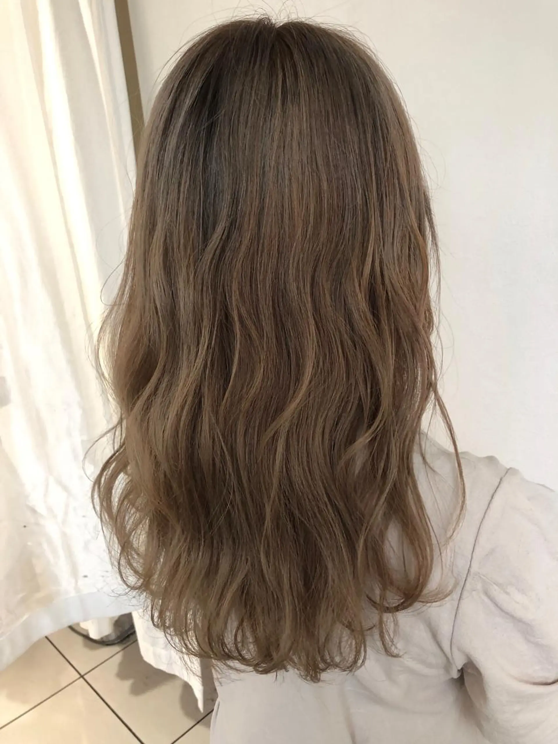 ロング 美髪矯正・レイヤー 倉友哉のヘアスタイル