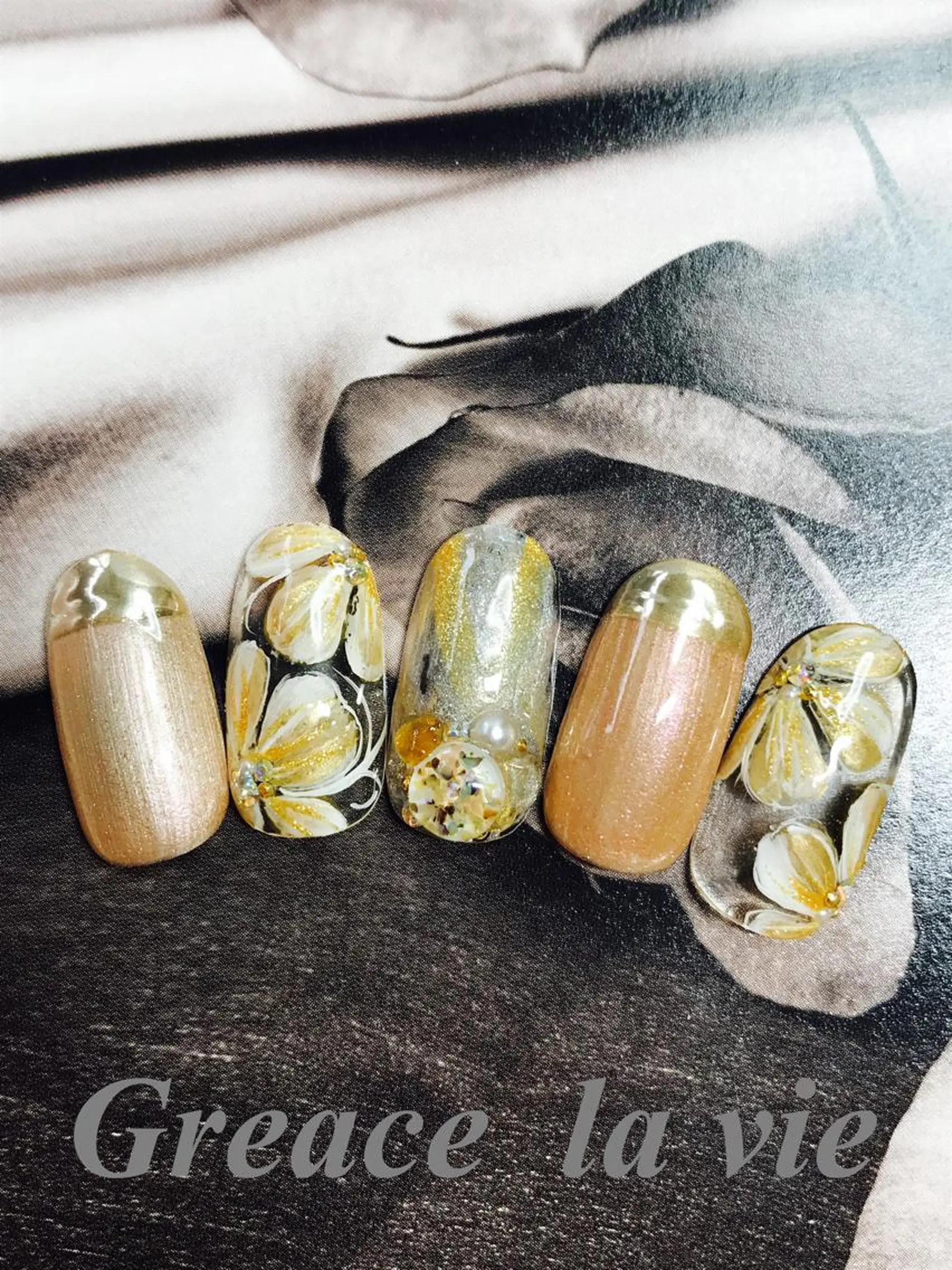 ロング カラー パーマ ヘアアレンジ キッズ ネイル マツエク・マツパ フラワーネイル ニュアンスネイル ニュアンスパーマ Greace la vie所属・Greace  la vieのネイルデザイン