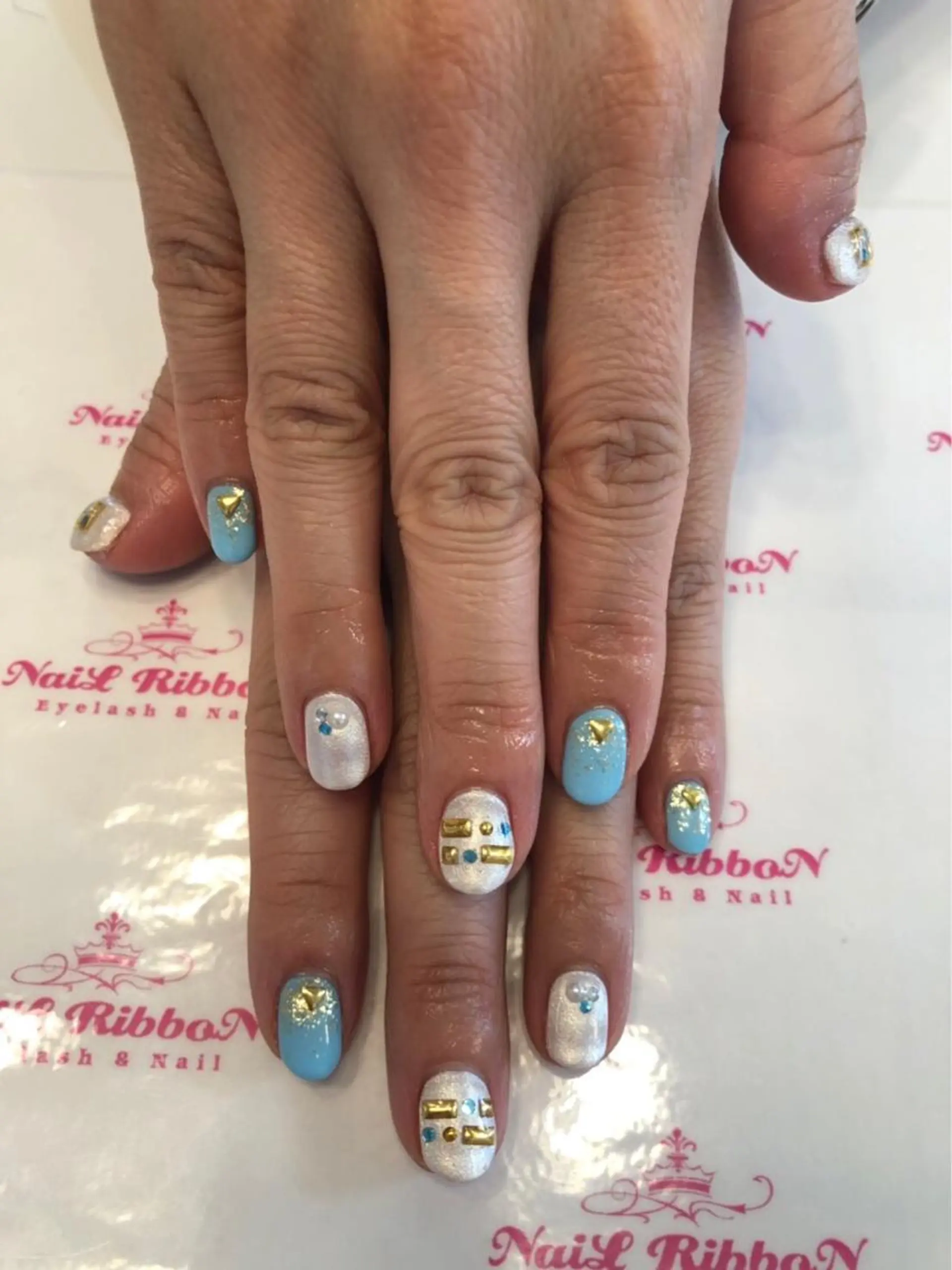 ネイル 春ネイル ネイルリボン 受付スタッフのネイルデザイン