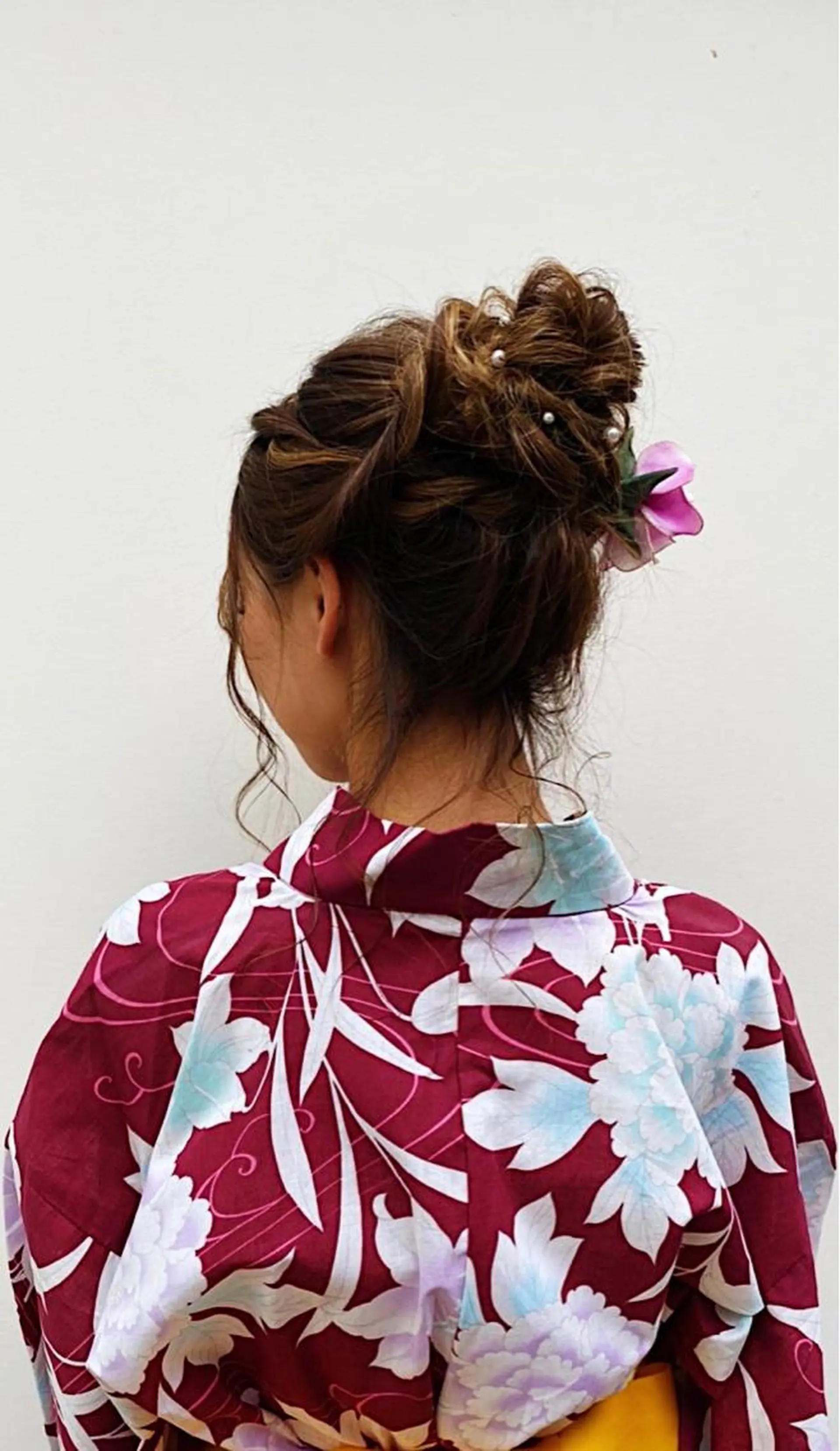 ロング お団子ヘア 卒業式のヘアスタイル 京都最安価エクステ muuka🦋のヘアスタイル