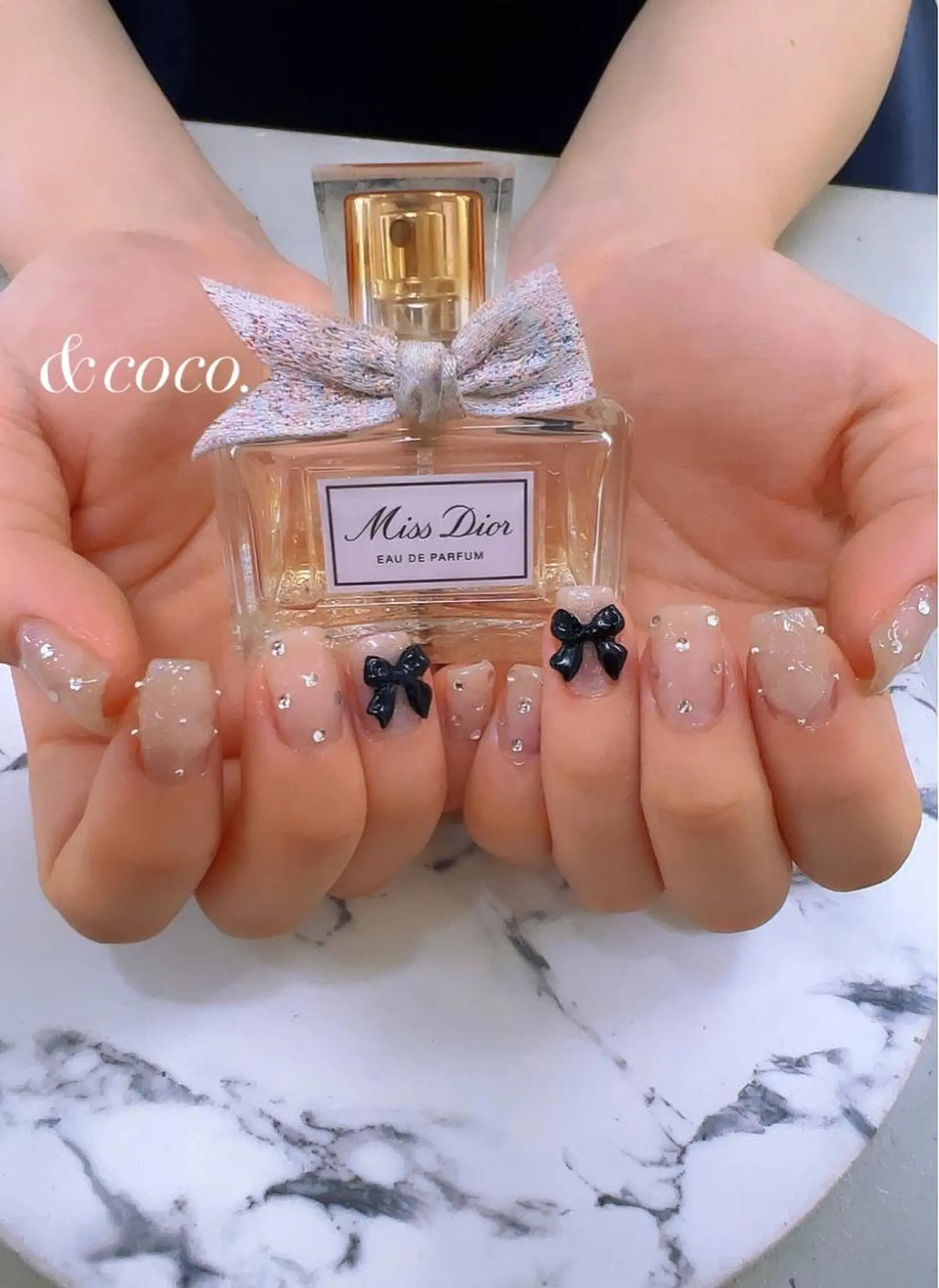 ネイル リボン ＆ coco.のネイルデザイン