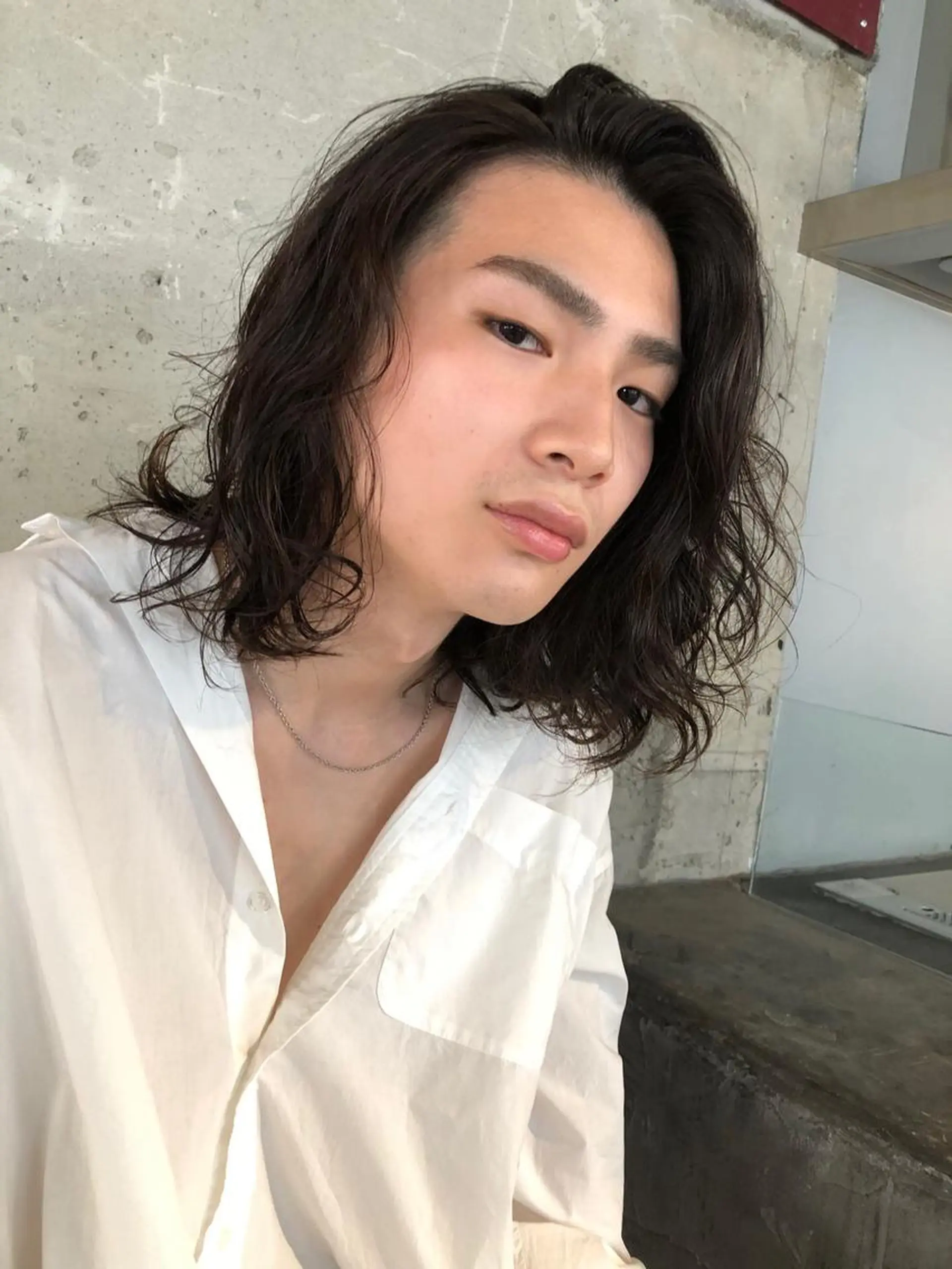 パーマ カイ マコトのヘアスタイル