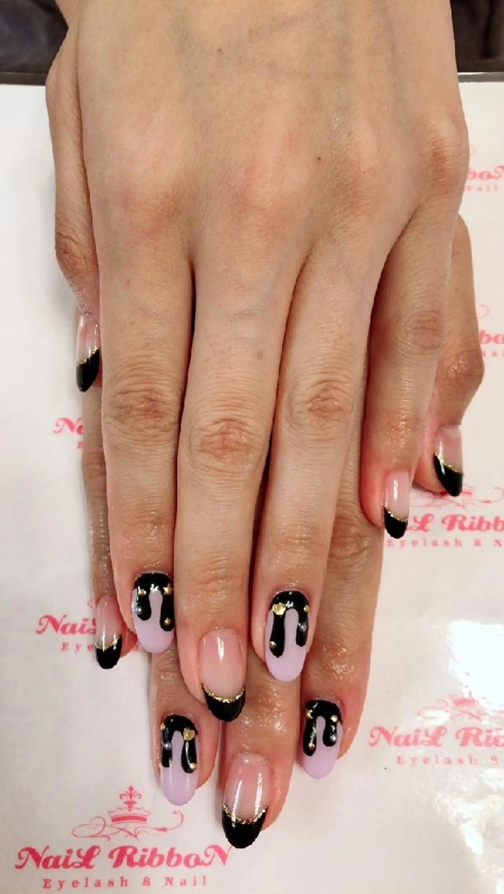 ネイル ネイルリボン 受付スタッフのネイルデザイン