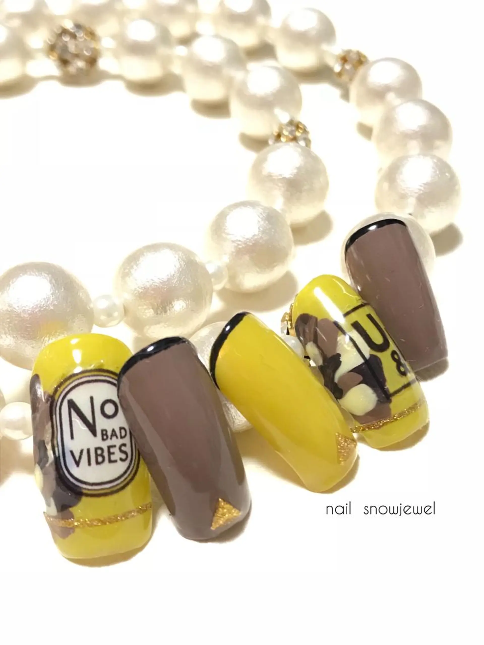 ネイル フラワーネイル 黄色 nail snowjewelのネイルデザイン