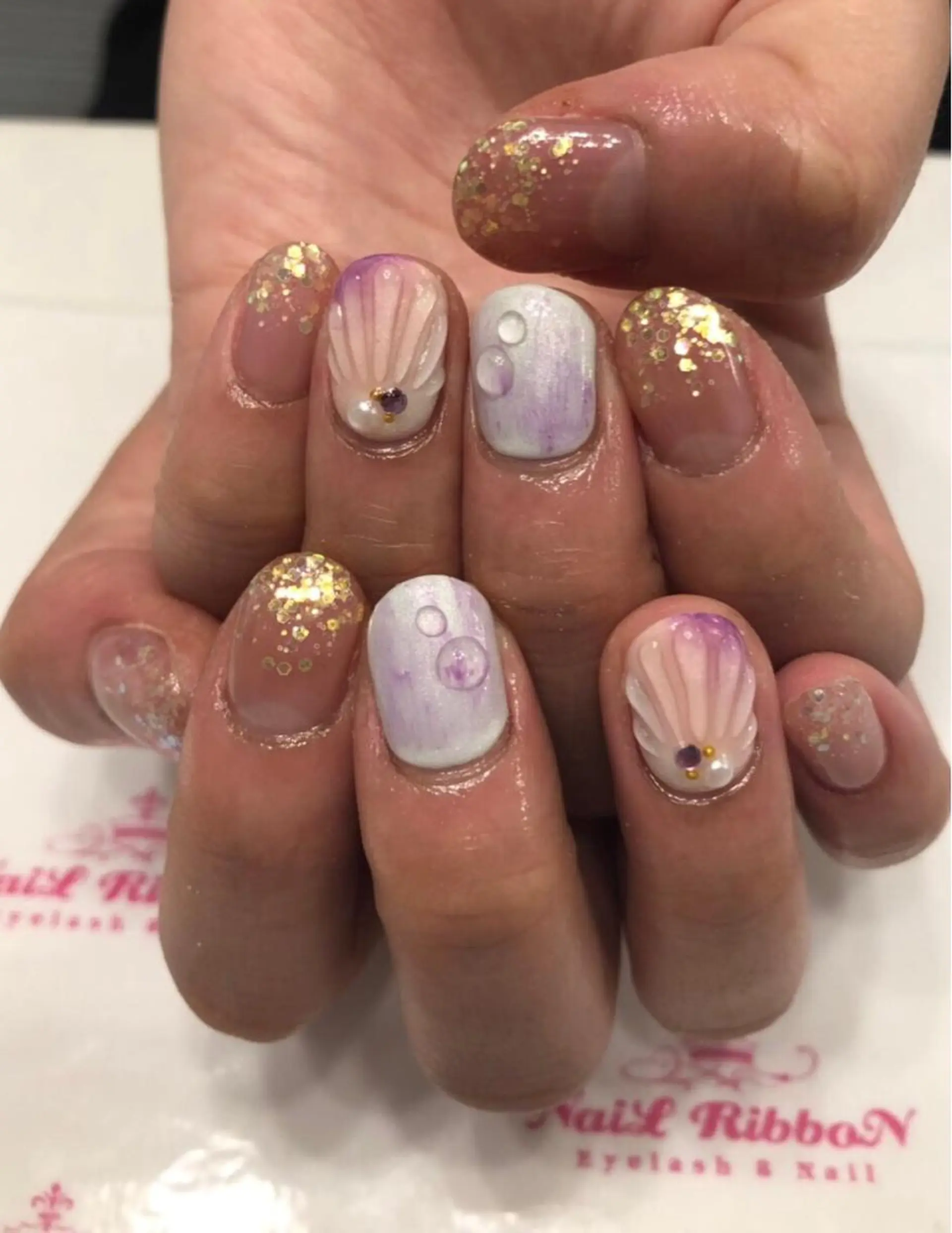 ネイル 春ネイル ネイルリボン 受付スタッフのネイルデザイン