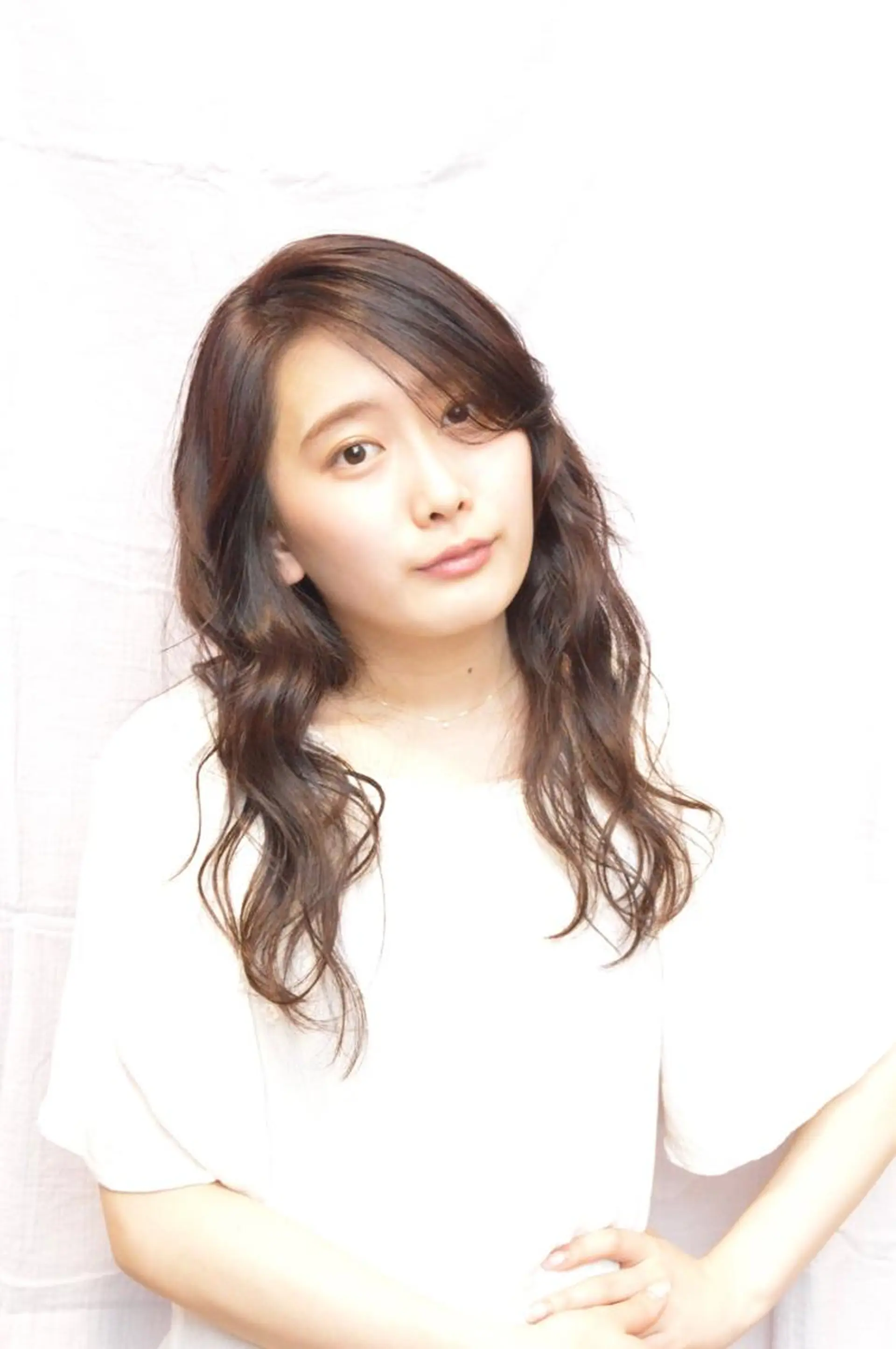 セミロング パーマ 星 沙織のヘアスタイル