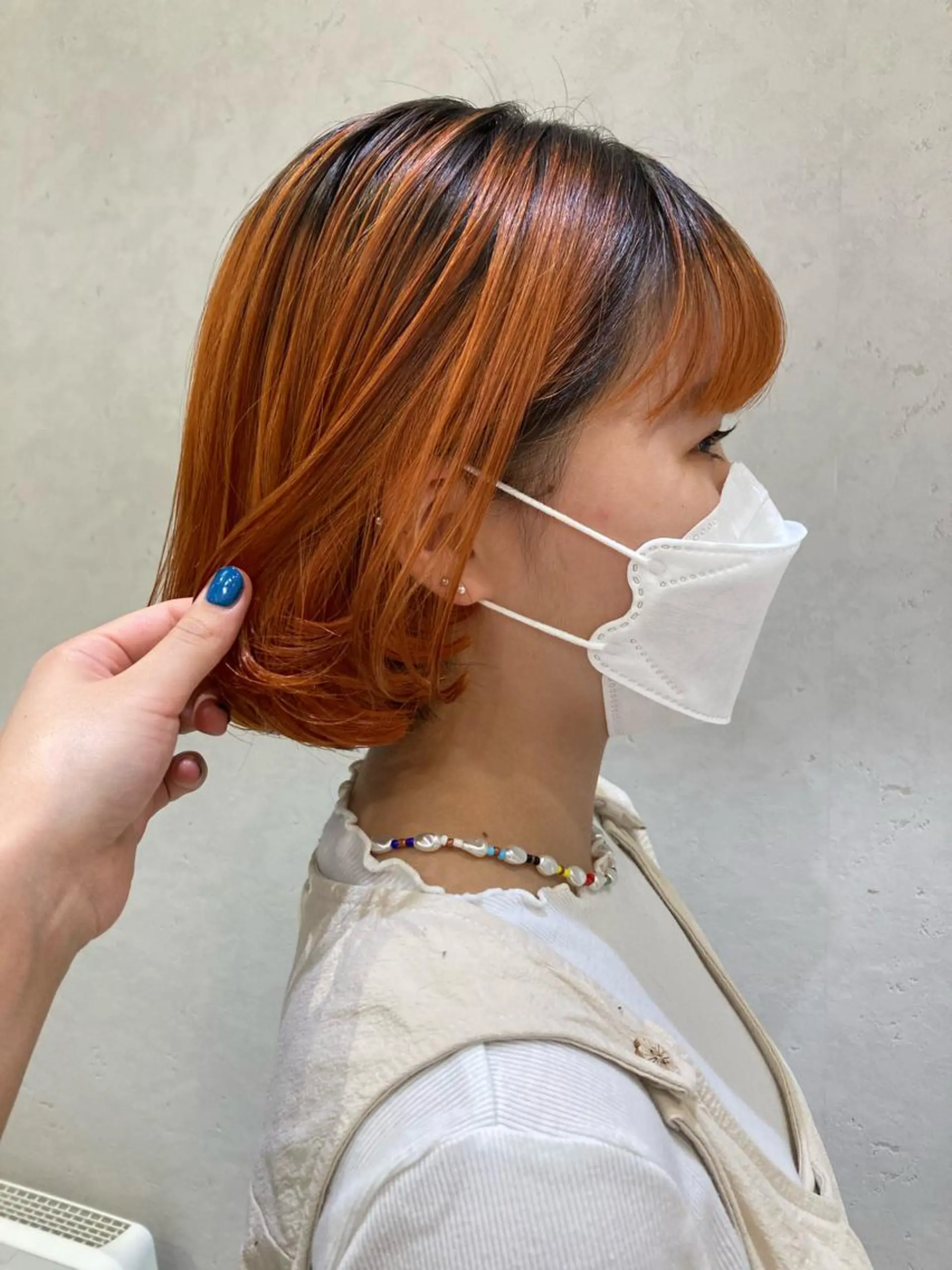 ショート カラー ブリーチ オレンジ nono/パーマ /顔まわりカット🐈のヘアスタイル